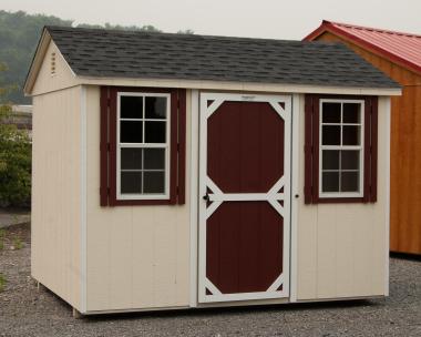 8x10 Peak Roof Style Storage Shed with Cream Siding, White Trim, Red Door, and Red Shutters
